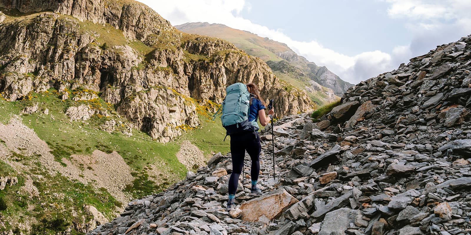 women with Deuter backpack in mountains