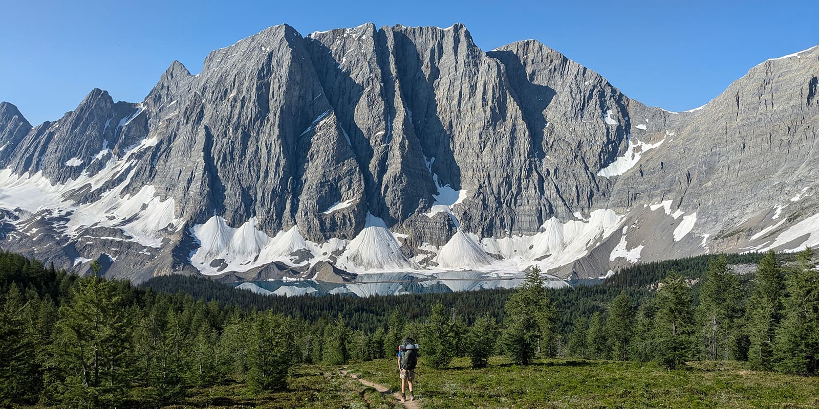 person hiking on the Rockwall trail in Canada