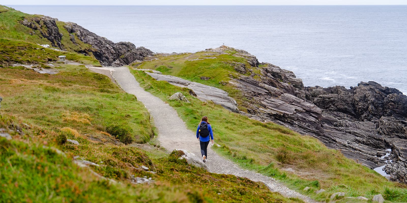 person hiking on the Malin Head trail