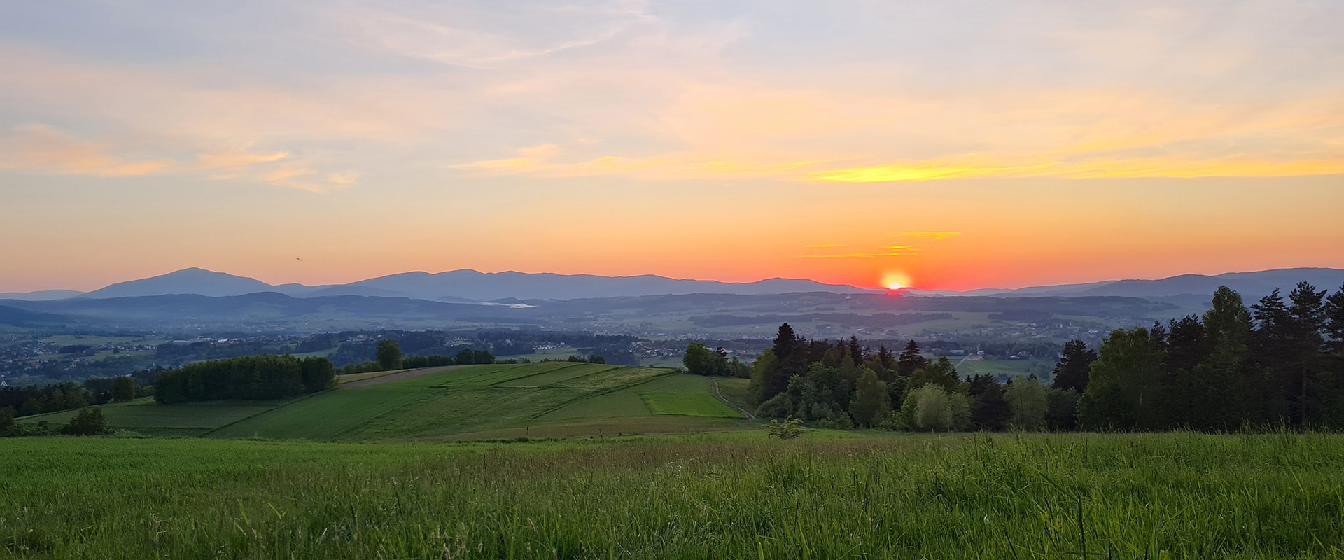 countryside in Poland with mountains in background