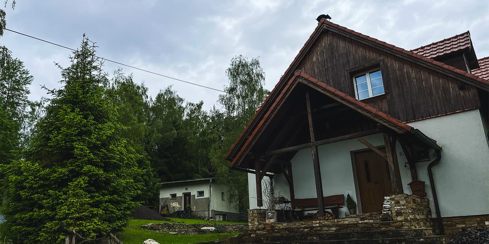 small wooden house in forest