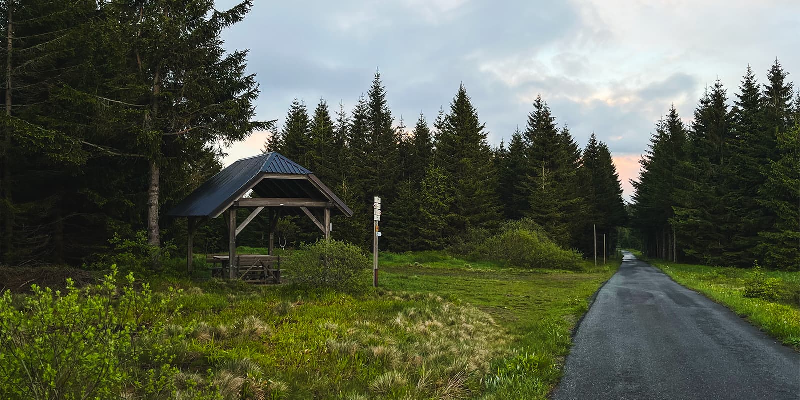 hiking trail near aspalt road in czech republic