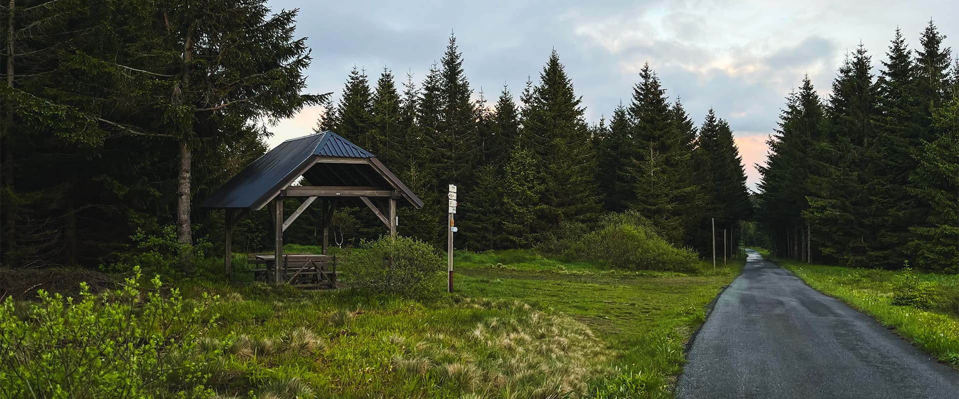 hiking trail near aspalt road in czech republic