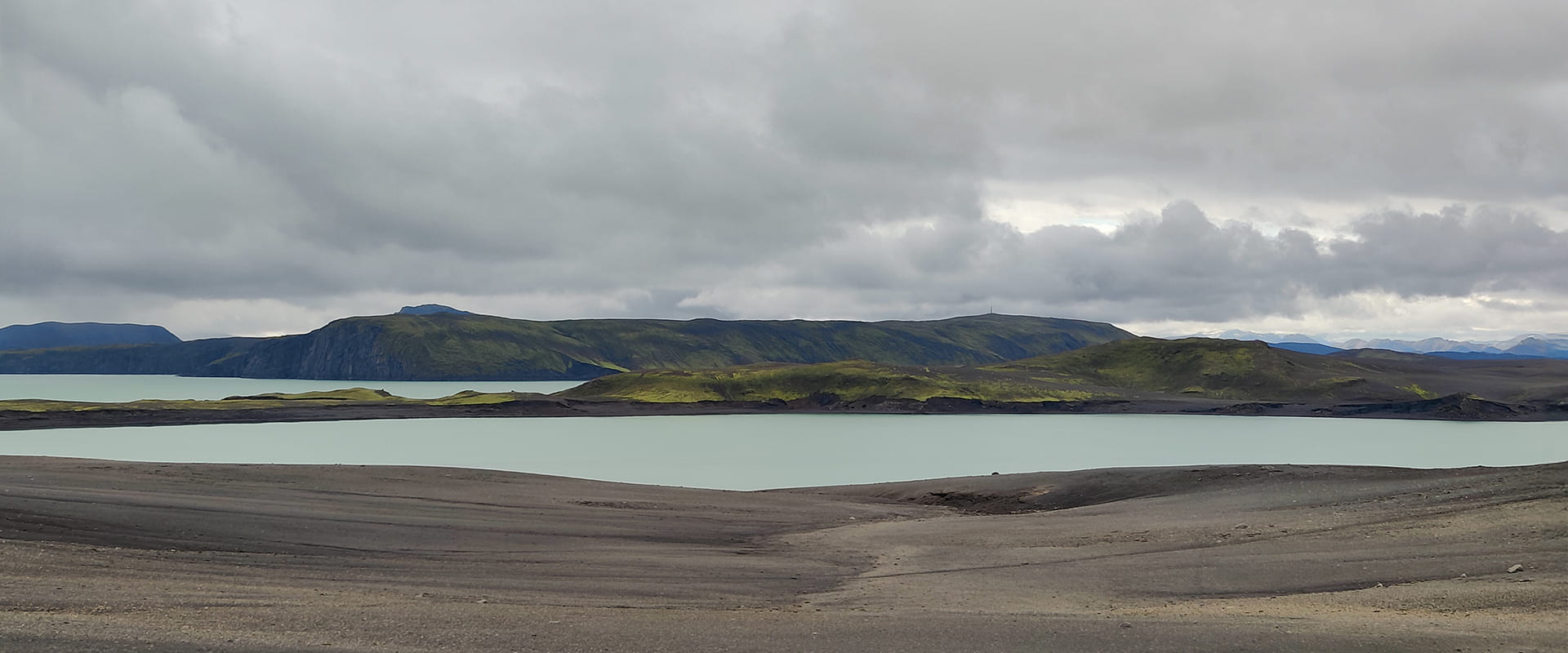 icelandic landscape near body of water on the iceland crossing