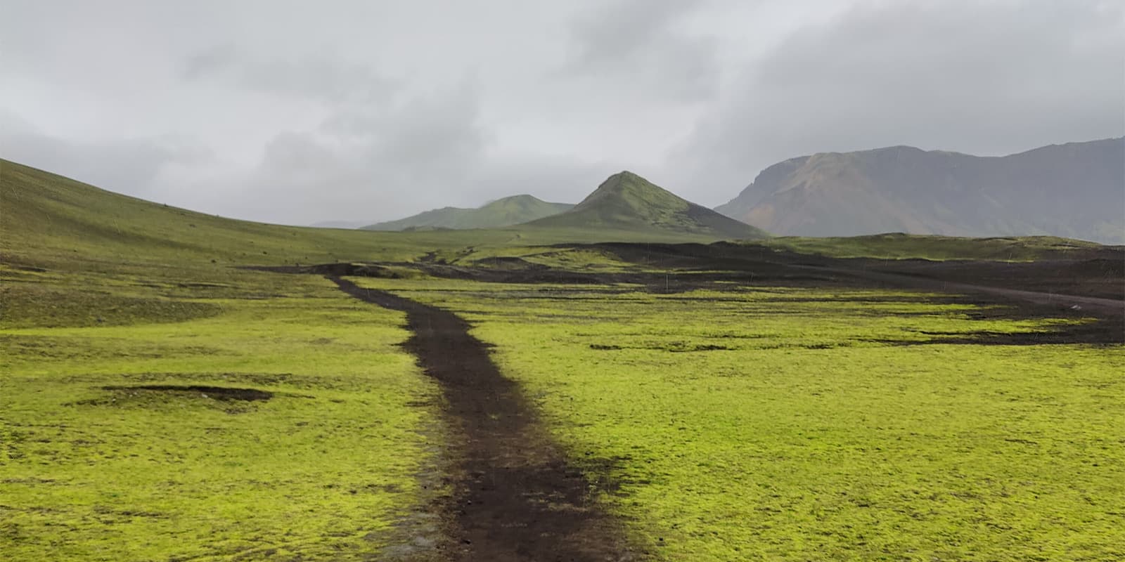 green and black landscape of iceland