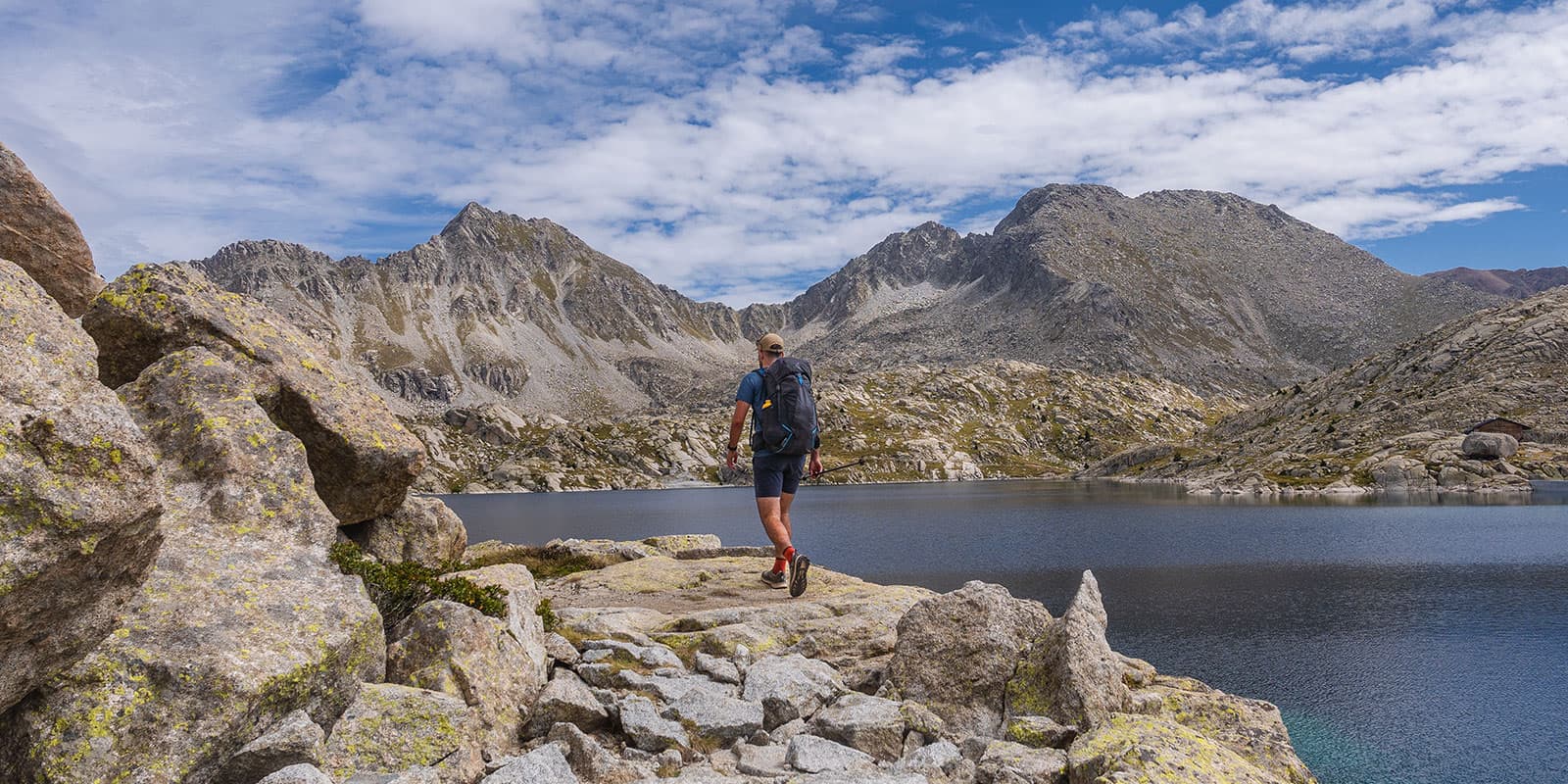 person hiking in catalonia with gregory backpack