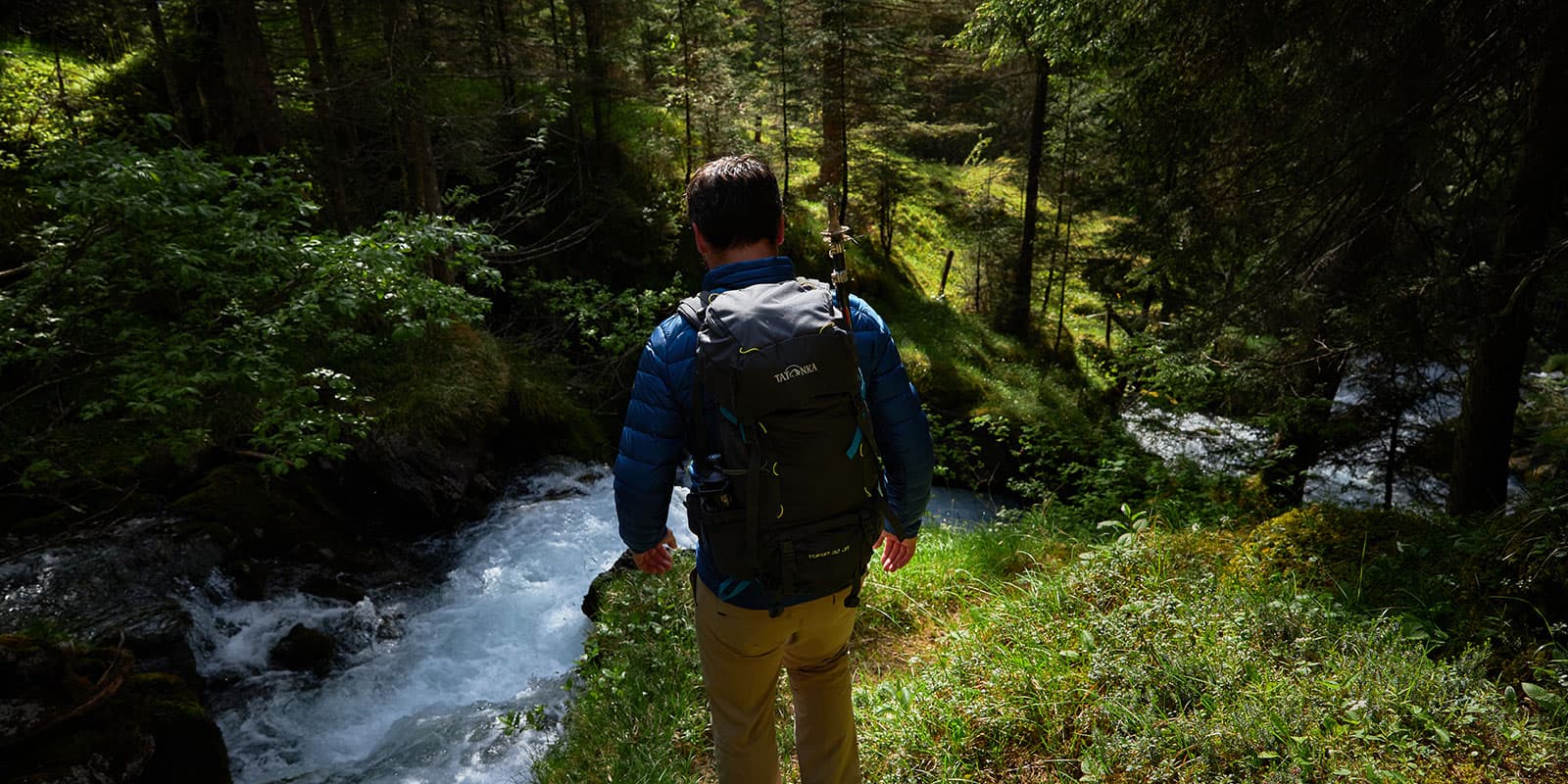 person hiking on the Lechweg near Doser Waterfall