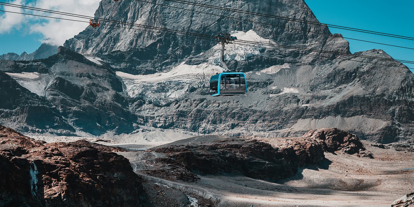 Cable Car from Trockener Steg to Kleines Matterhorn above Zermatt in the Swiss Alps in front of the Matterhorn.