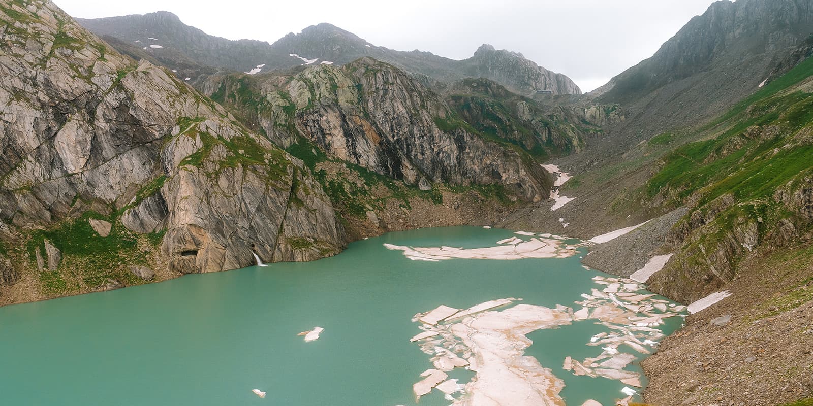 lake with ice near capanna Cristallina