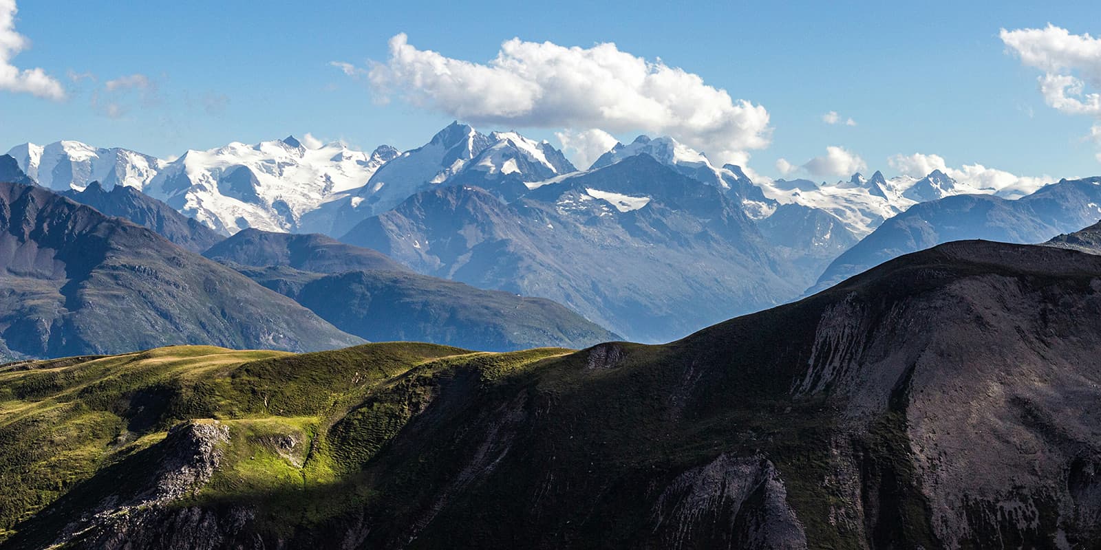 Swiss mountains in Bernina with snow capped peaks in the background