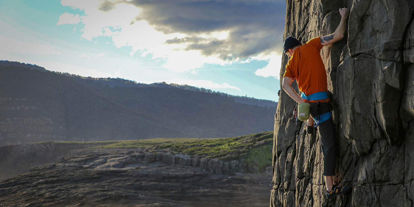 climber on the side of a mountain