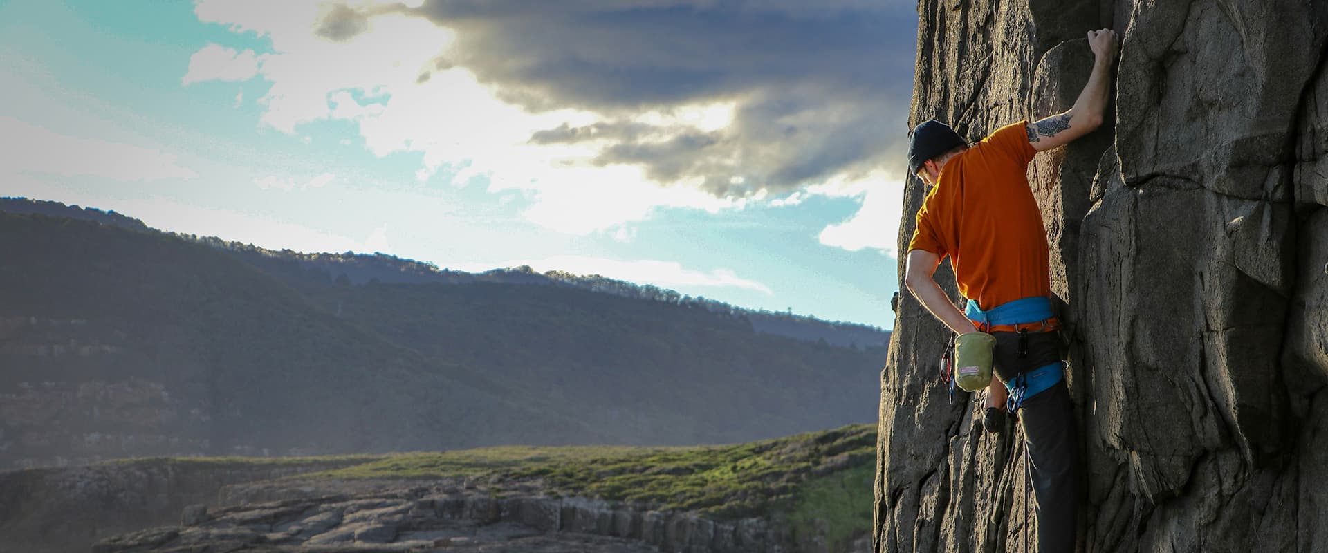 climber on the side of a mountain
