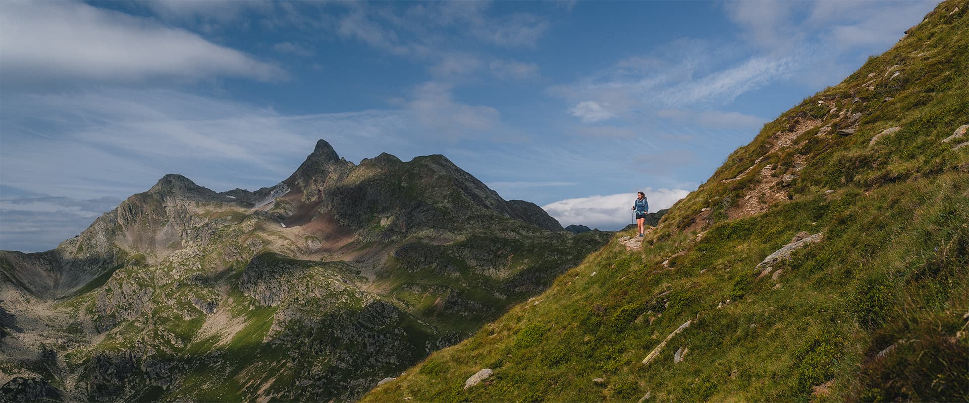 person hiking on the Hufeisentour in the Sarntal Alps in Italy