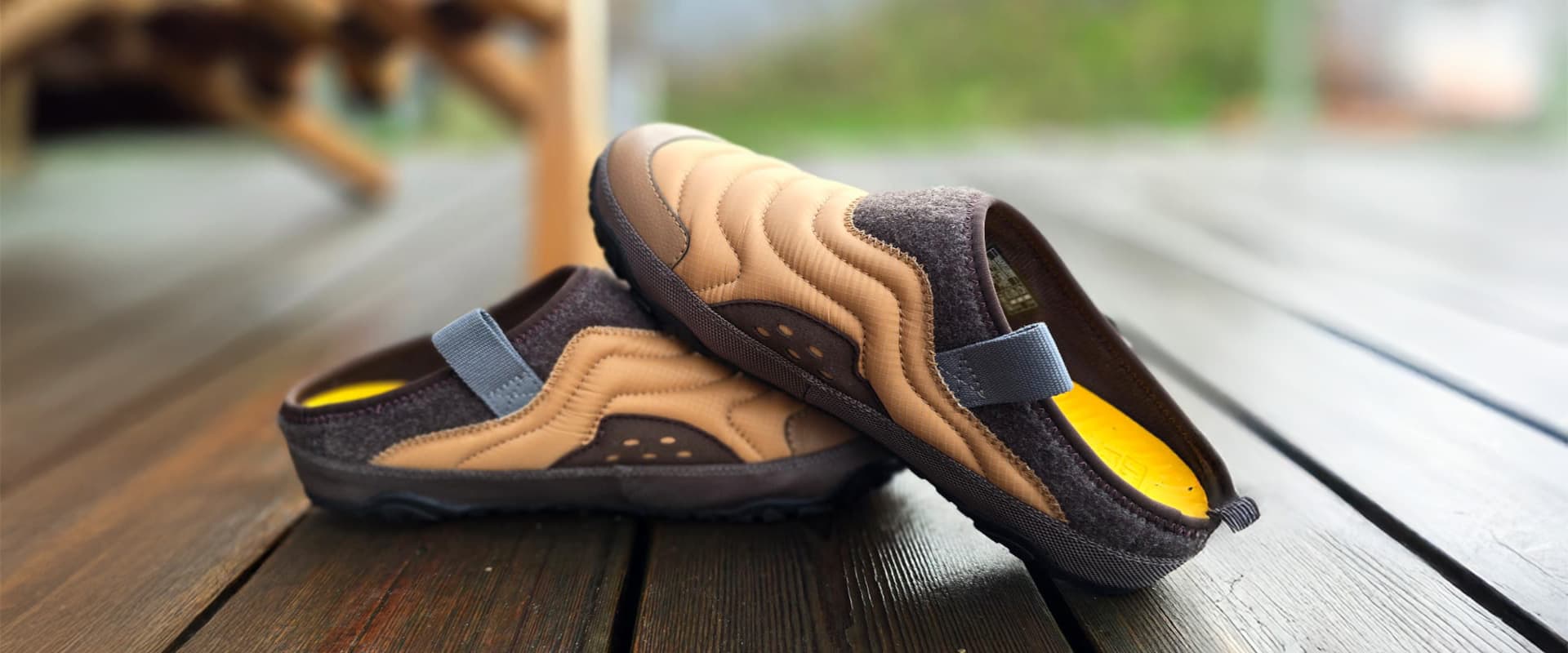 Teva shoes on wooden surface