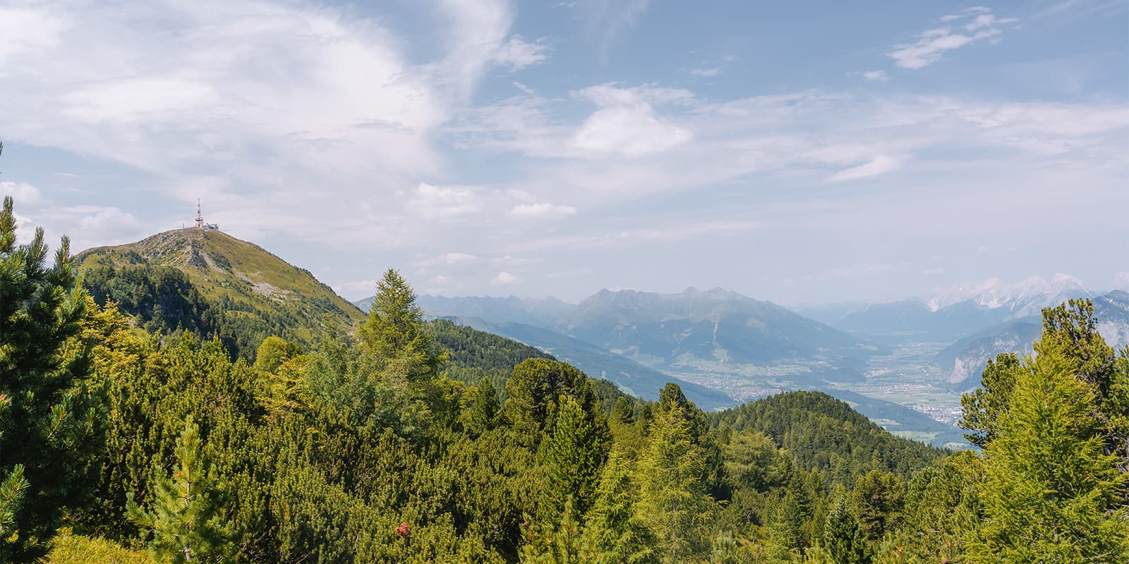 view of Innsbruck valley from the top of the Zirbenweg