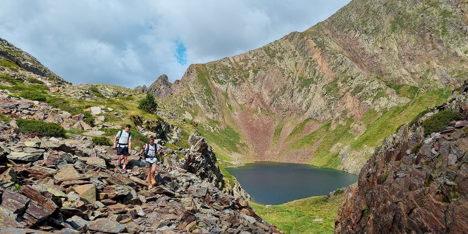 hikers on the Porta del Cel hiking trail in the Pyrenees