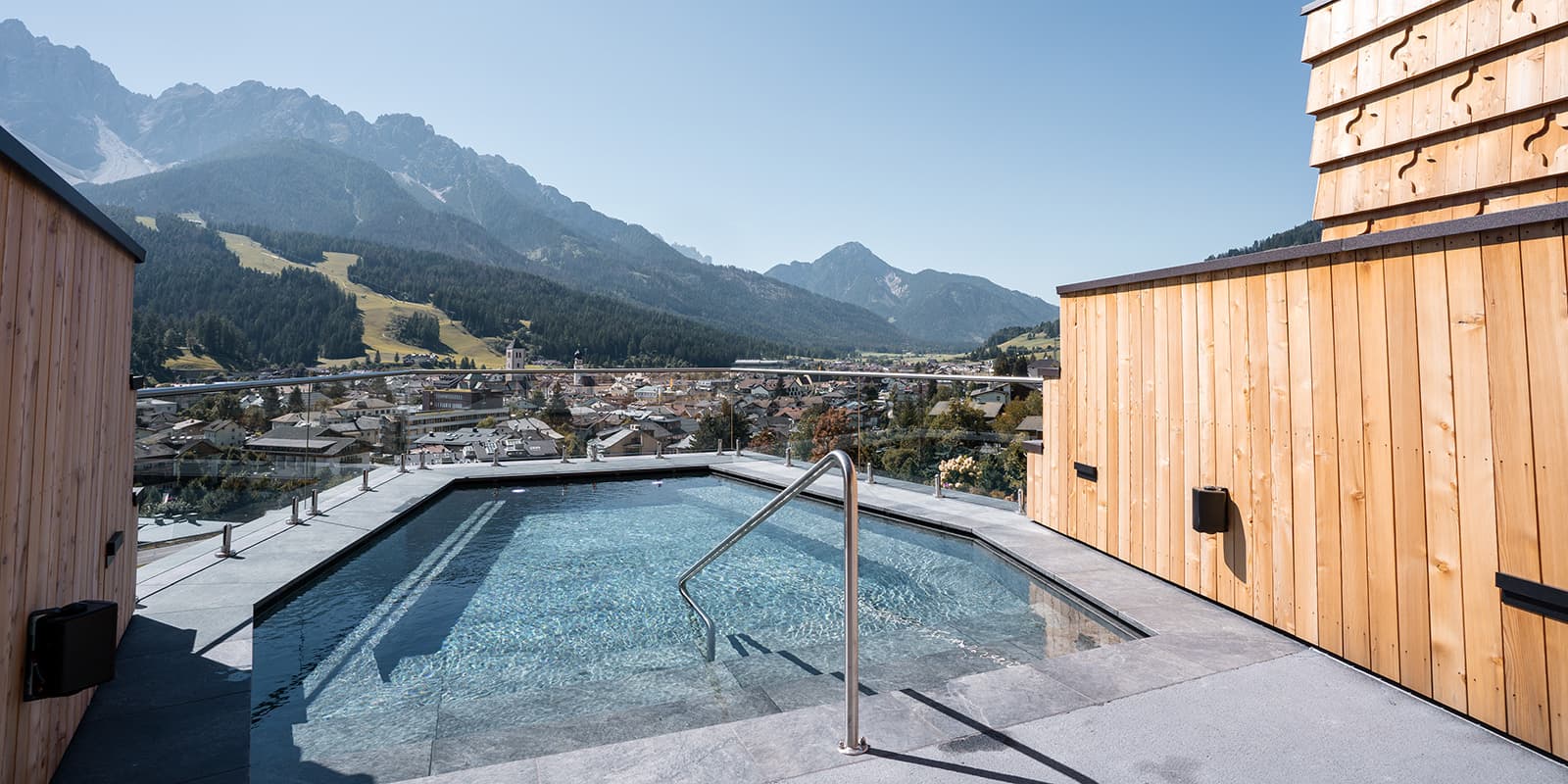 small swimming pool in Hotel Leitlhof overlooking the Dolomites