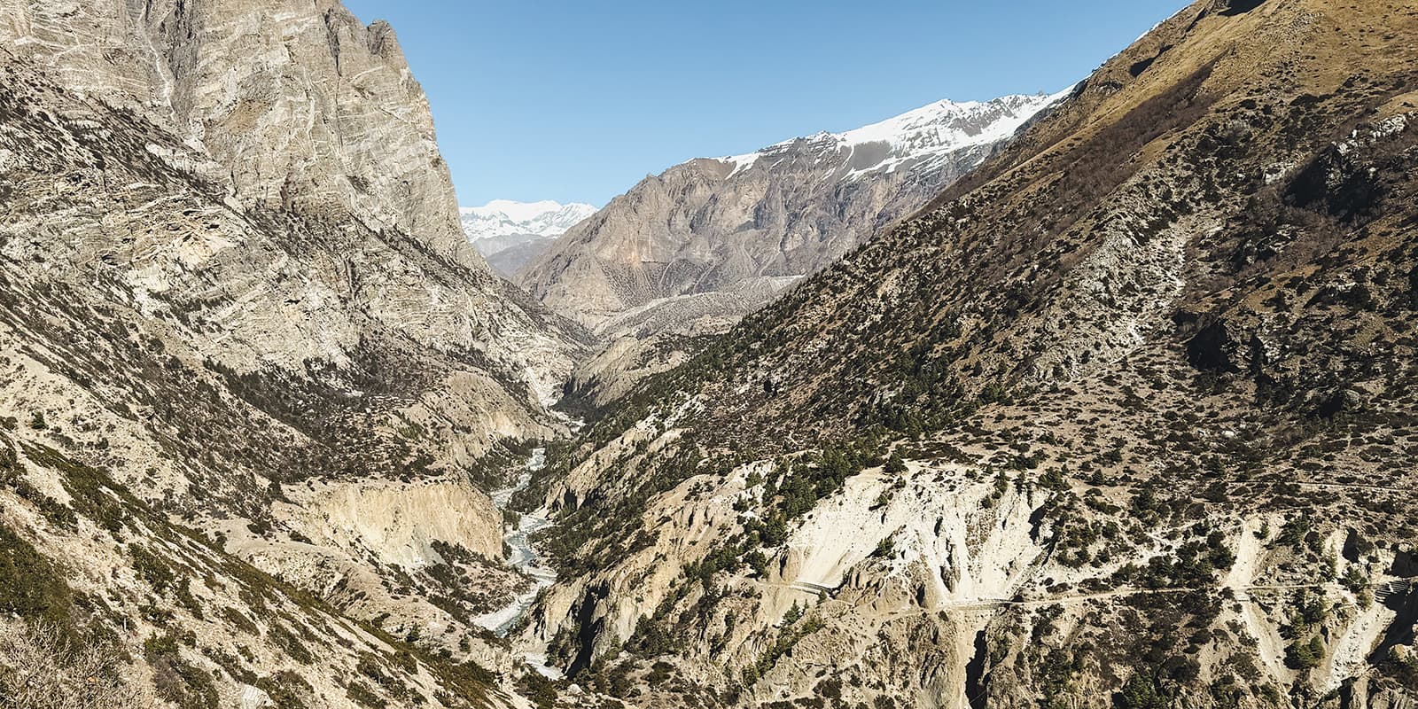 river flowing in mountain valley in Nepal