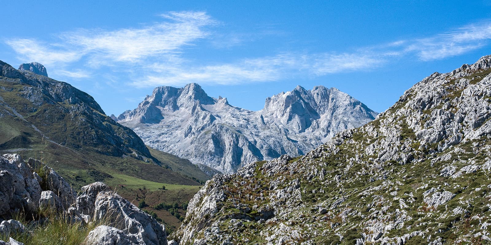 panoramic view of mountain range in Picos de Europa on the El Anillo de Picos hiking trail