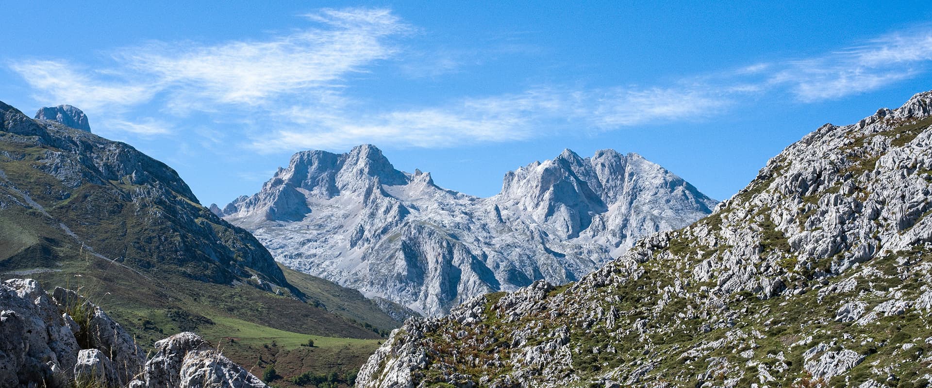 panoramic view of mountain range in Picos de Europa on the El Anillo de Picos hiking trail