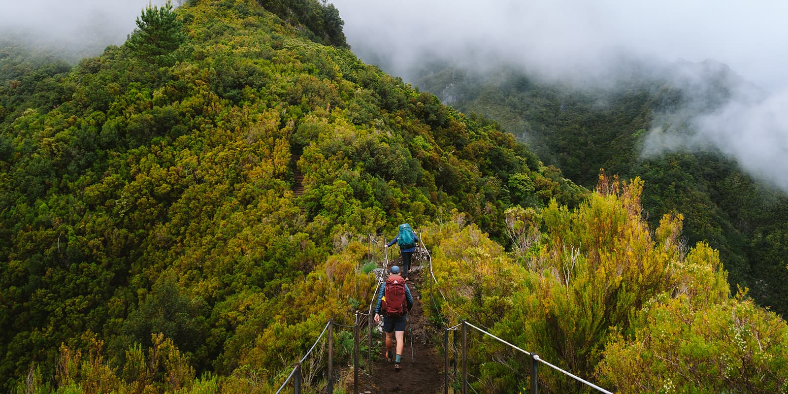 two hikers on mountain ridge in Madeira on the PR17