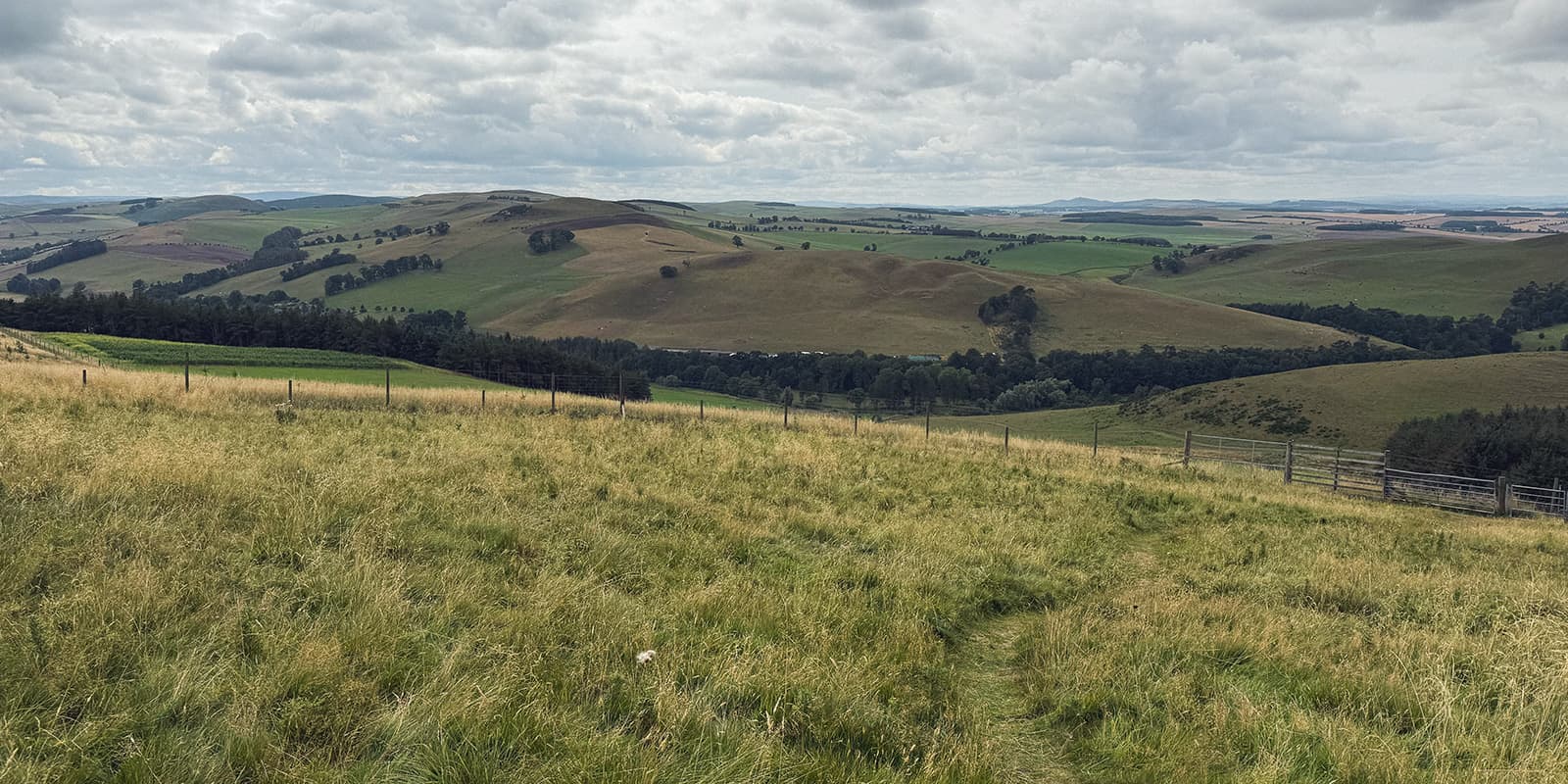 hiking trail in Scottish countryside on the St. Cuthbert's Way