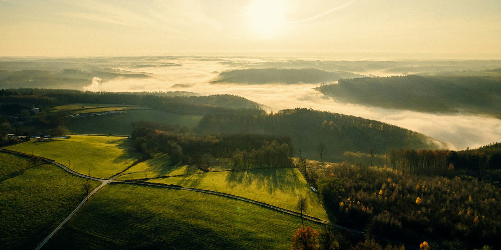 drone shot of the sun rising over Schwarzwald in Germany