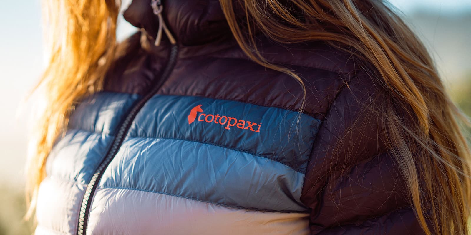 close up of Cotopaxi logo on down jacket