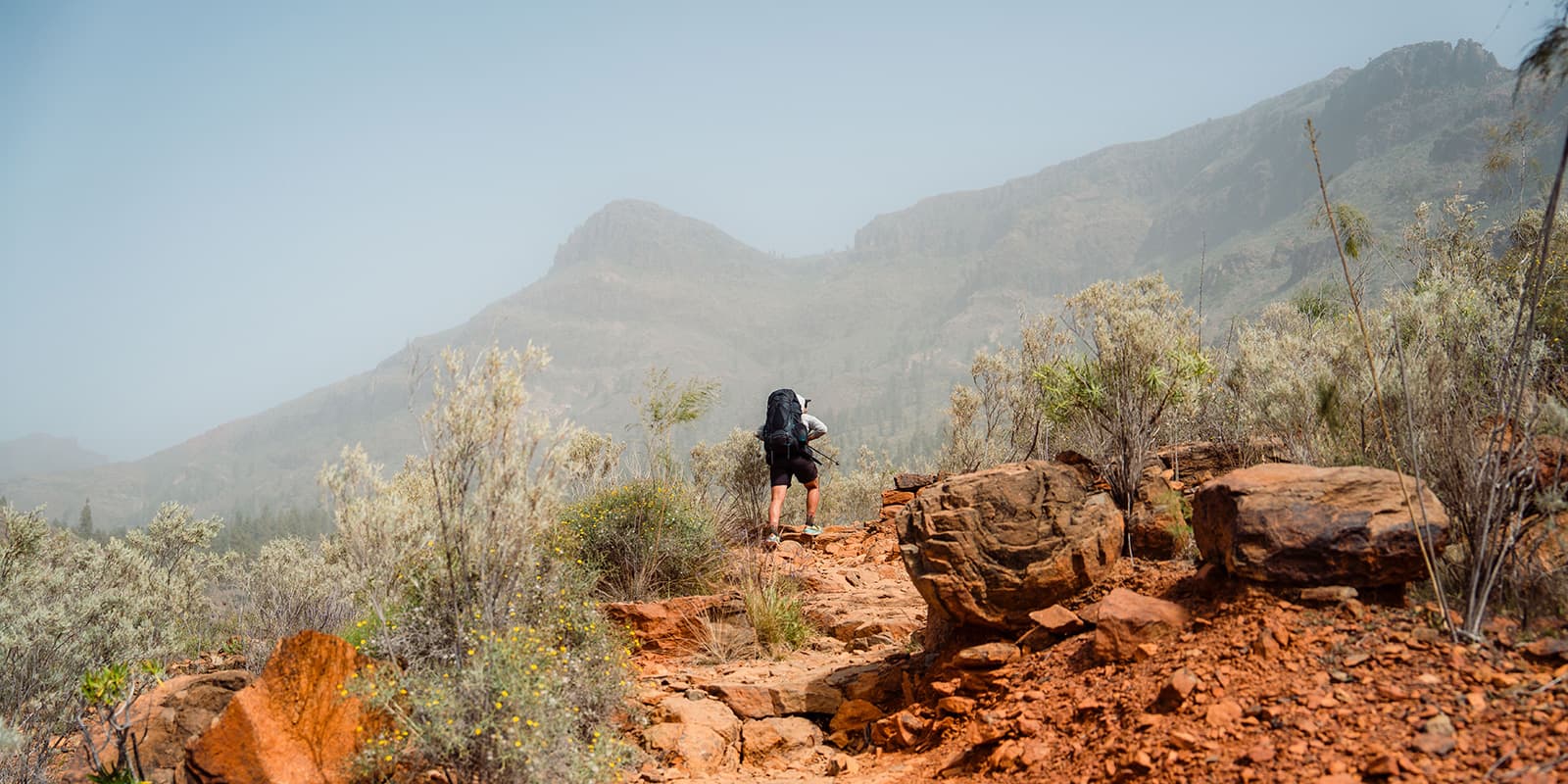 person hiking up mountain on the GR131 in Gran Canary