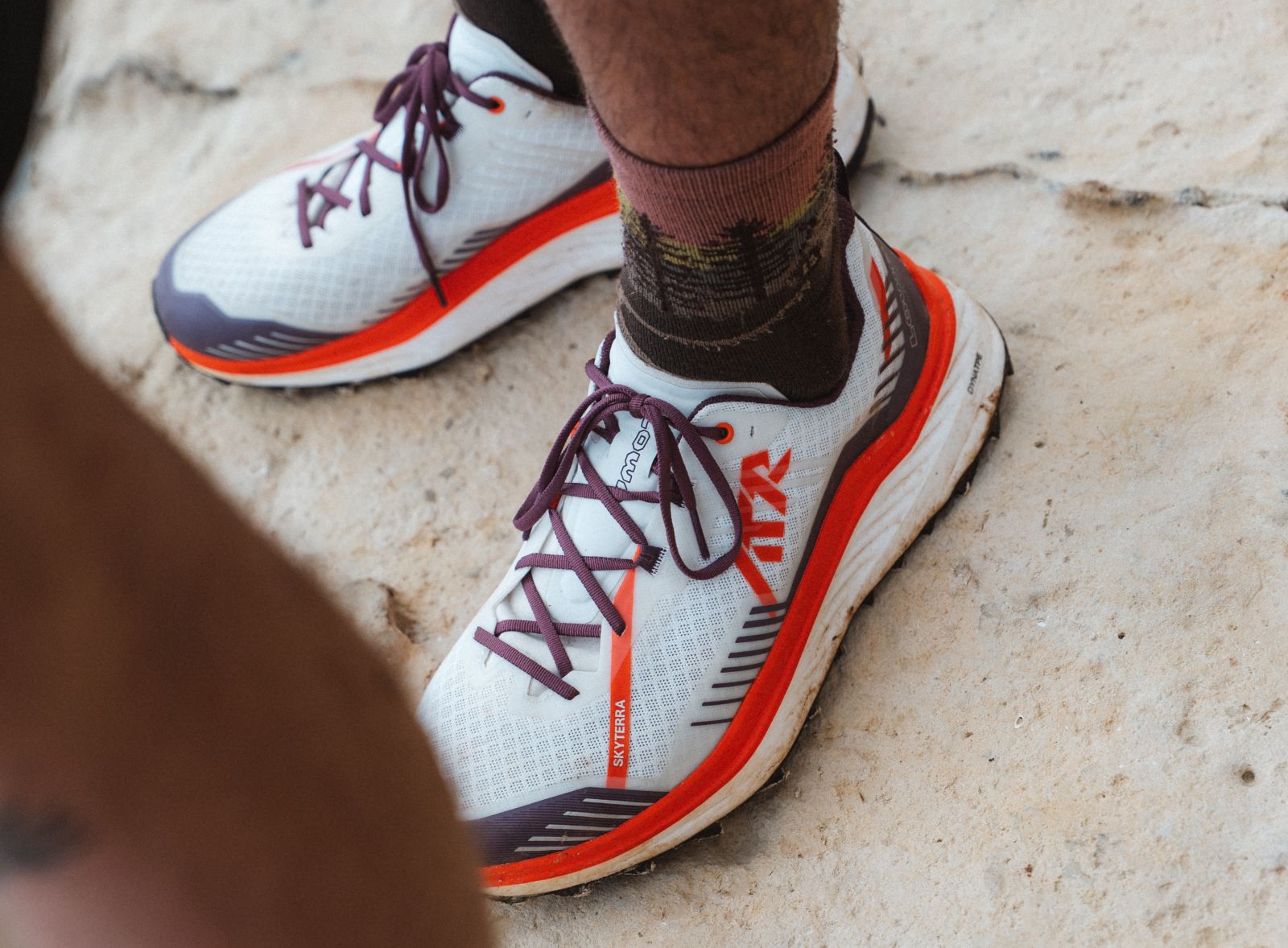 Standing on a rock wearing the SKYTERRA shoes